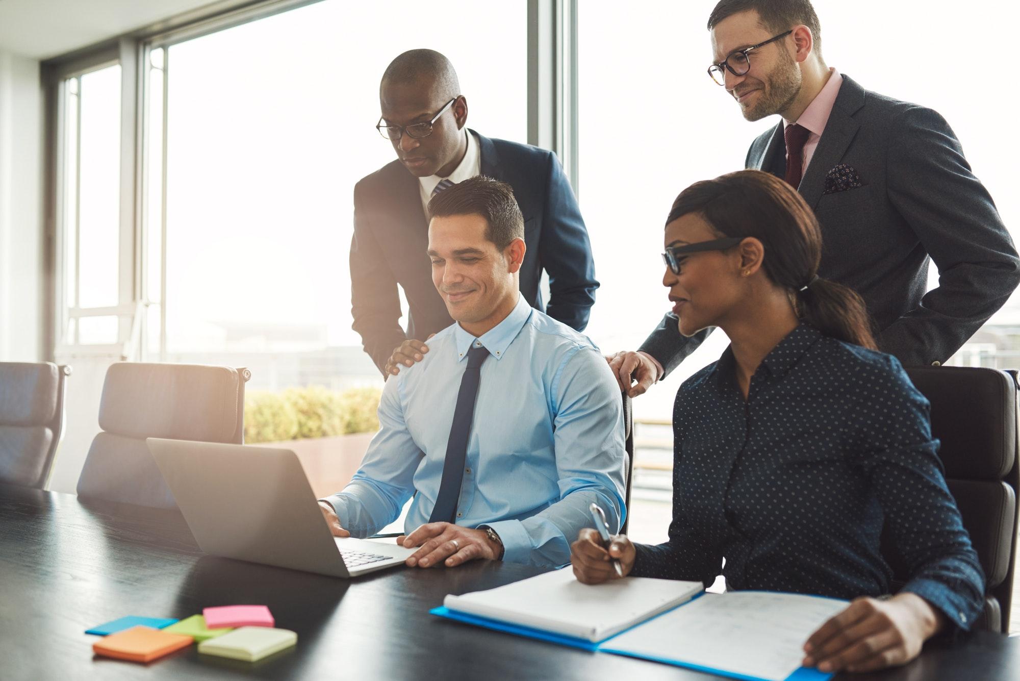 Happy group of business people in office